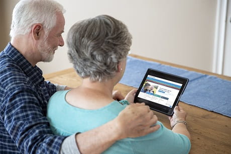 Grandparents video chatting with Geisinger