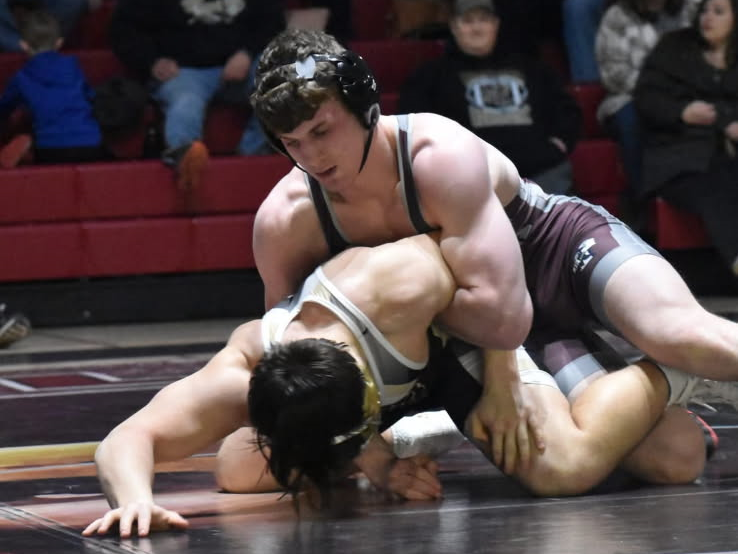 Connor Wetzel wrestling with an opponent