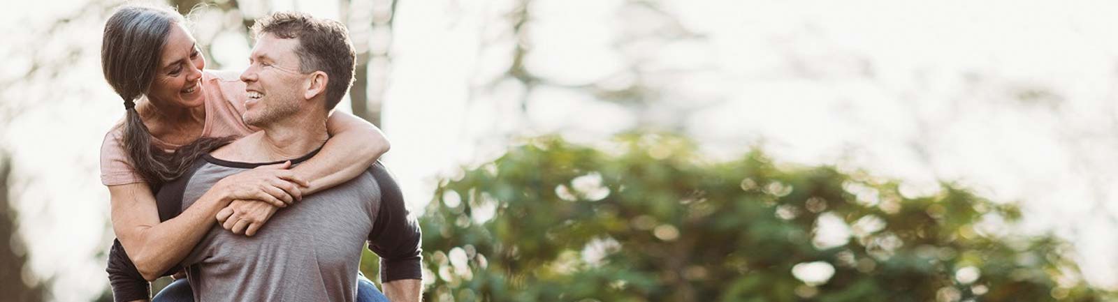 Man carrying a woman on his back |Esophageal Cancer Care – Treatments and Symptoms