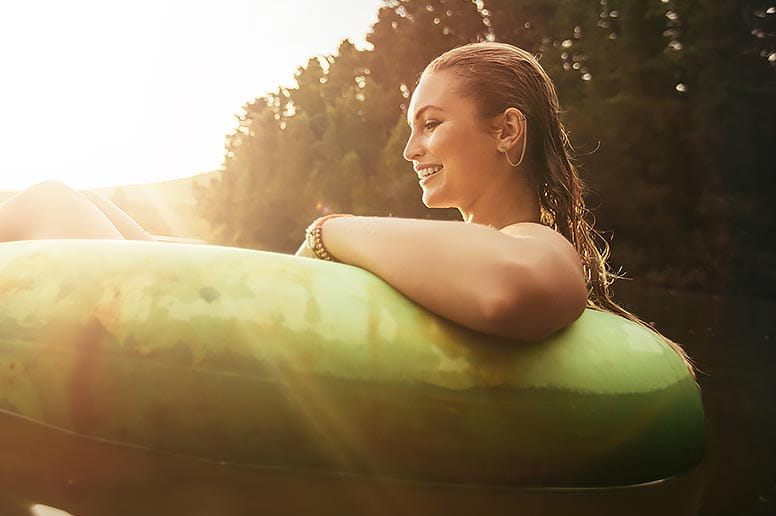 Woman resuming normal activities following rhinoplasty surgery