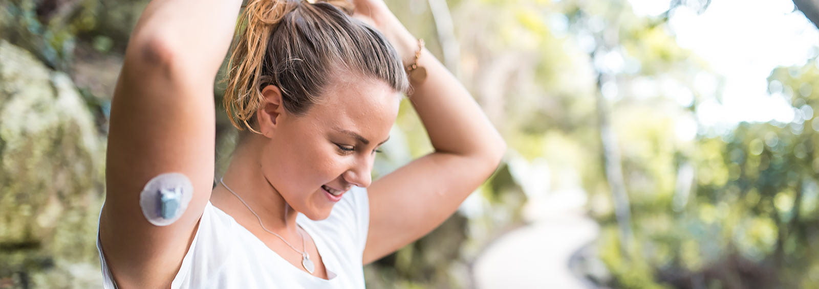 Young female patient managing type 2 diabetes with insulin patch