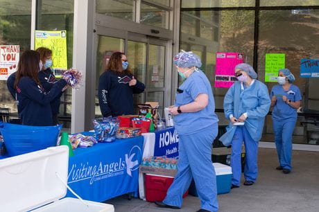 Visitors masking before entering hospital