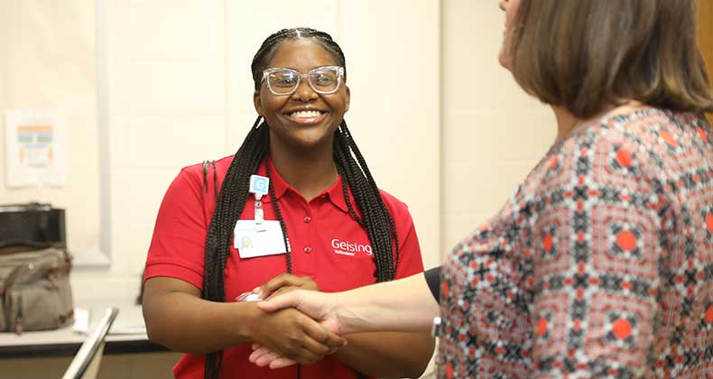 geisinger grad student greeting patient