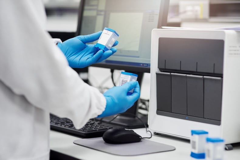 an image of a scientist conducting medical research in a laboratory