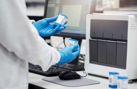 an image of a scientist conducting medical research in a laboratory