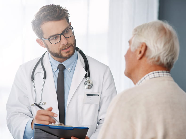 A doctor talking to a patient