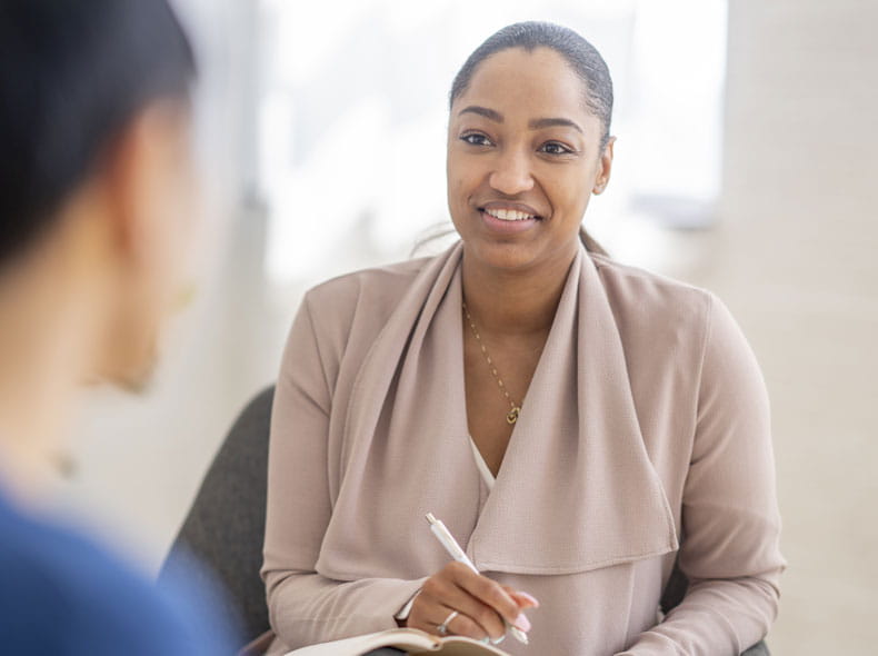 a psychiatrist talking to a patient