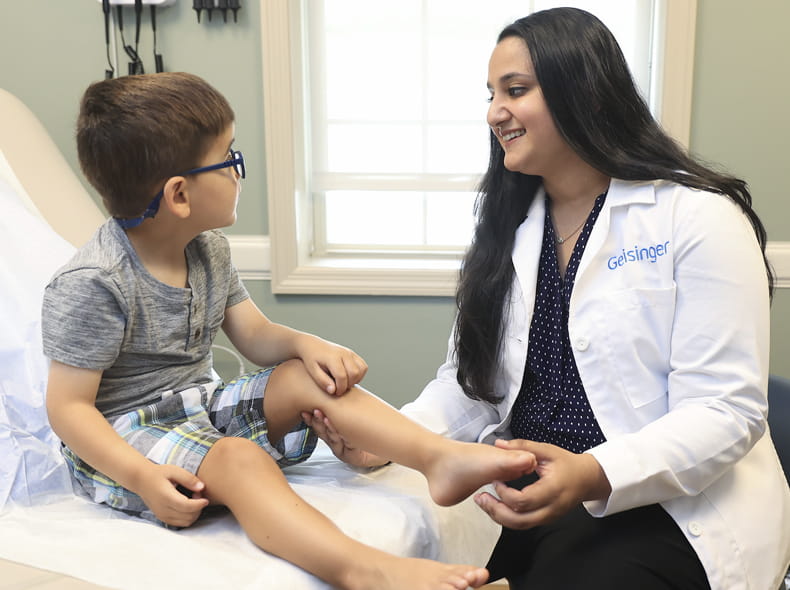 an image of a doctor with a young patient