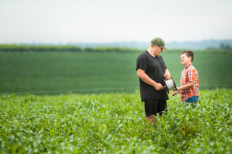 boys standing in a field