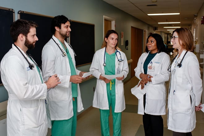 Five Geisinger providers having a conversation