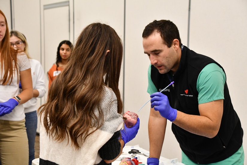 Members of the AiM Hi program learning new medical skills