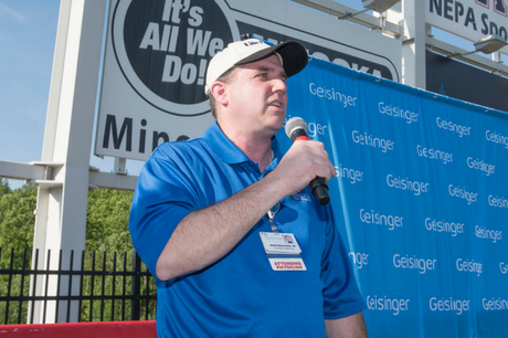 Dr. David Schoenwetter announces winners of EMS Provider of the Year.