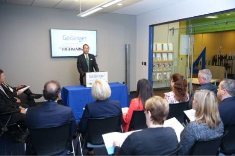 Highmark employee addresses crowd regarding opioid usage and dangers.