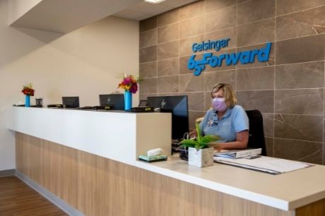 Cynthia Klebon, one of the Geisinger 65 Forward Shamokin-Coal Township patient access representatives, sits.