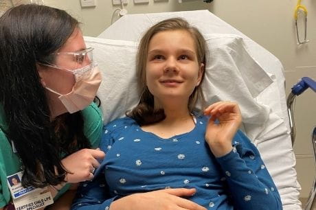 Child Life Specialist Rose Lauck and patient Leah Williams.