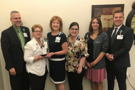 Geisinger Lewistown leaders accept award.