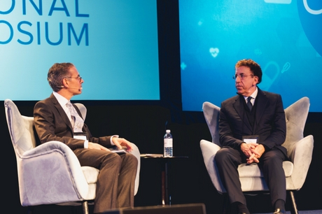 Dr. David Feinberg and Dr. Dean Ornish chat during Geisinger's national symposium.