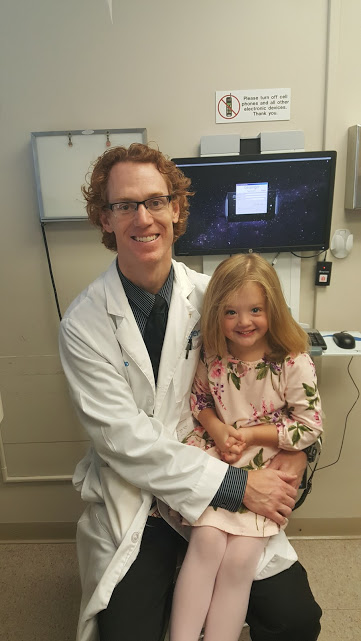 Laila Mattucci sits with her doctor.