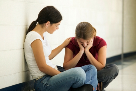 Mother talking to her daughter