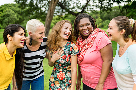Diverse group of ladies celebrating International Women's Day