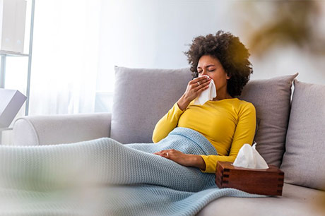 Woman taking a coronavirus sick day