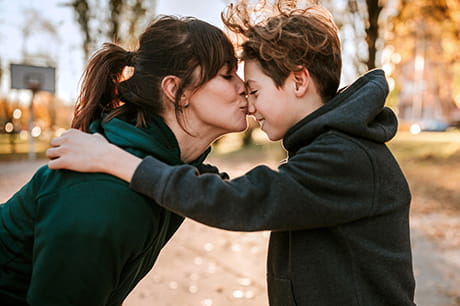 mother supporting her non-binary child