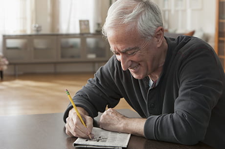 Man working on a puzzle
