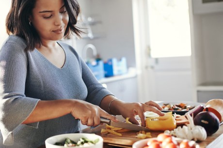 woman cutting vegetables