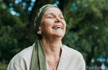 A woman smiling