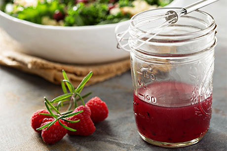 A prepared serving of flavorful raspberry vinaigrette.