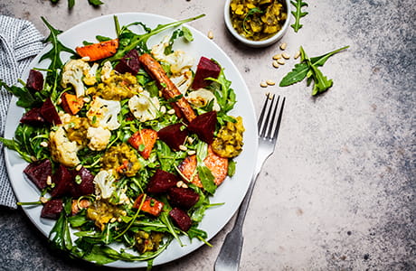 A prepared dish of rosemary balsamic roasted vegetables.
