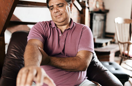 A man experiencing signs of a stroke.