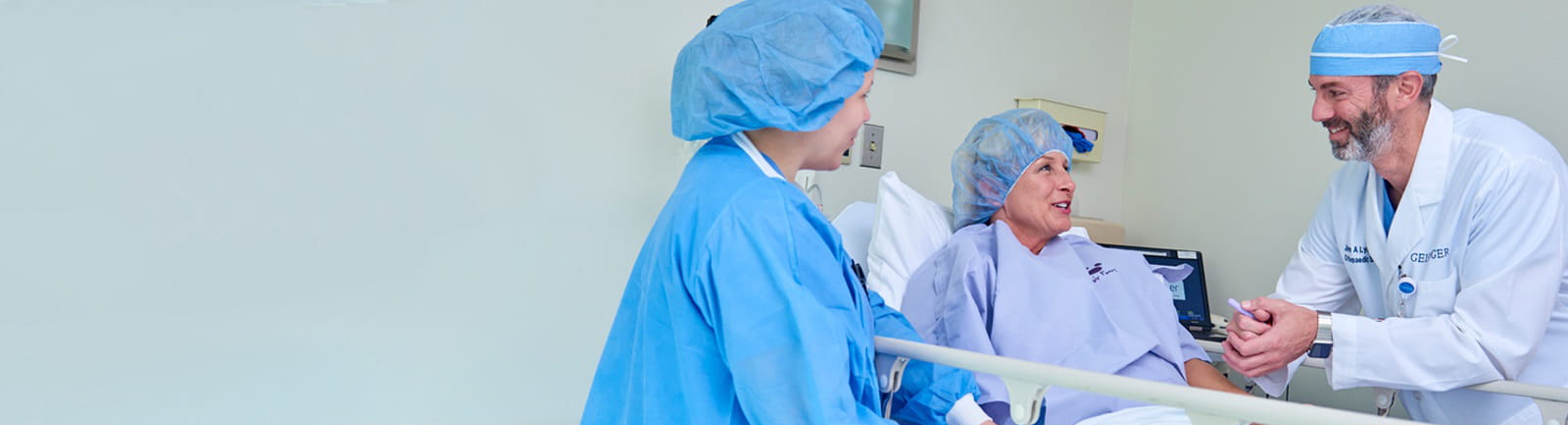 CTS-patient-smiling-at-doctors-anesthesiology-operating-room-gswb-16