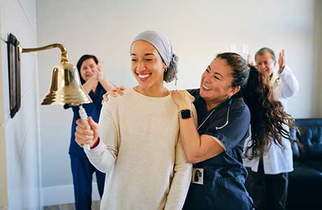 A cancer patient ringing the bell
