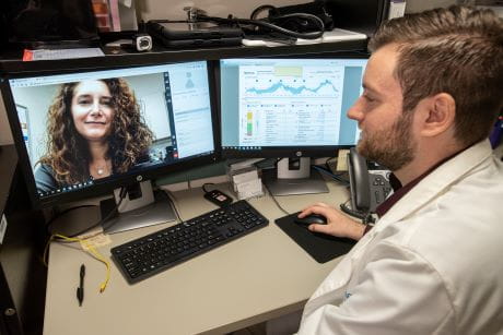 A doctor having an online meeting with a patient