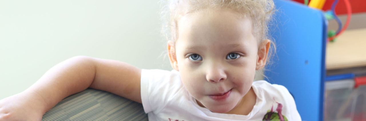 girl in flower shirt