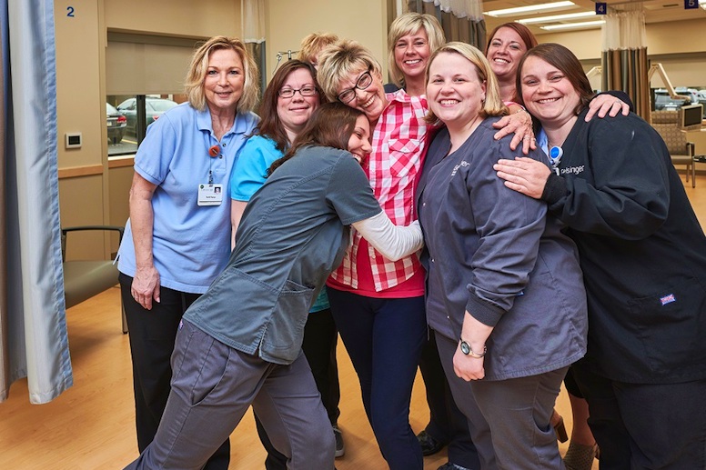 woman with medical team