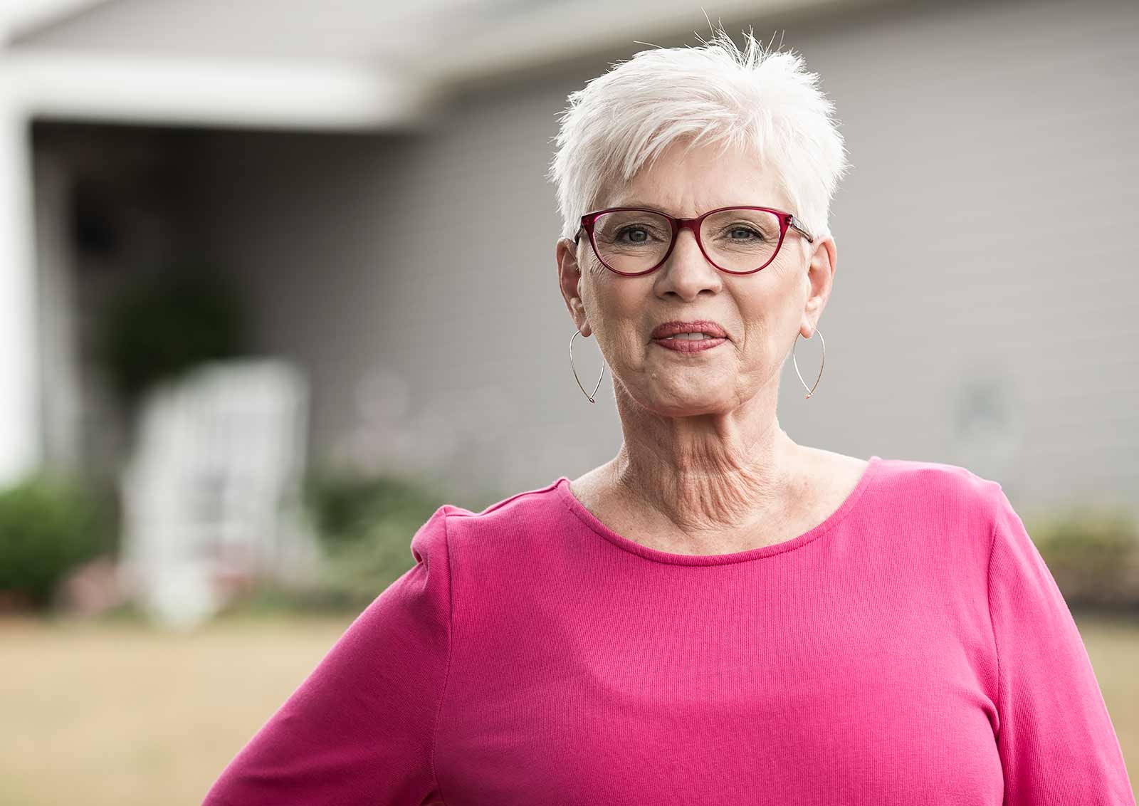 Cancer survivor, Kathy Lahr, stands outside of her Milton, Pa. home.