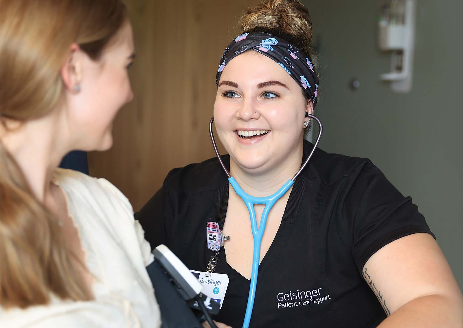 Future nurse Hannah Leach taking vital signs on a patient.